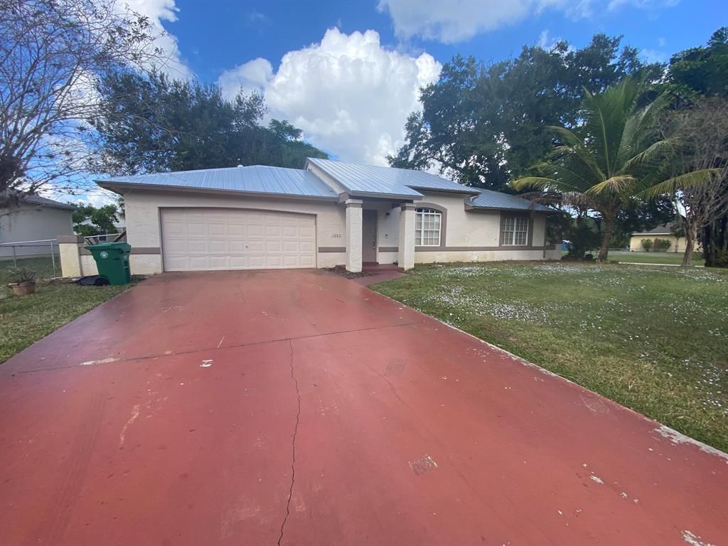 Photo of 1663 SW Ruiz Terrace Ter, Port St Lucie, FL 34953 (MLS # R10763714)