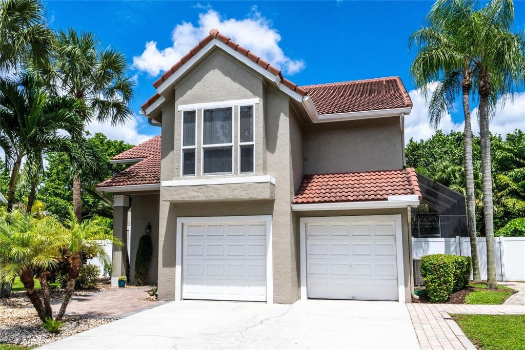 Photo of 6520 NW 57th Lane, Parkland, FL 33067 (MLS # F10463321)