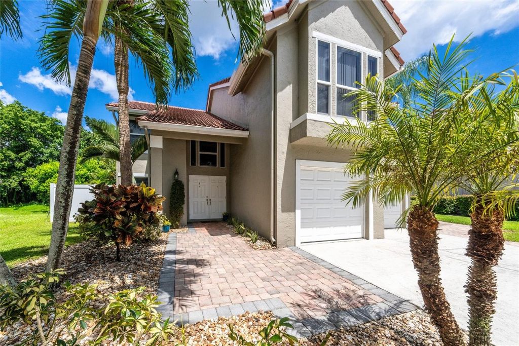Photo of 6520 NW 57th Lane, Parkland, FL 33067 (MLS # F10463321)