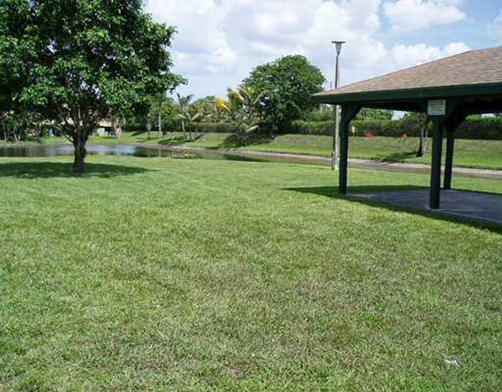 Photo of 5502 Channel Drive, Greenacres, FL 33463 (MLS # R10978265)