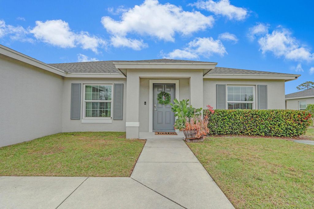 Photo of 743 SW Estate Avenue, Port Saint Lucie, FL 34953 (MLS # R11053076)