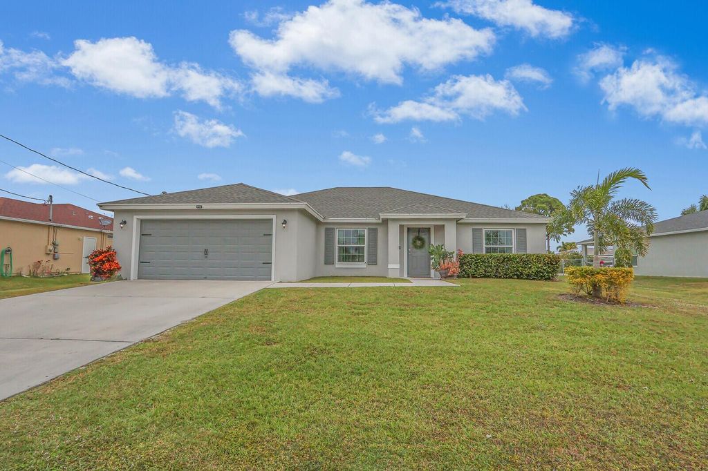 Photo of 743 SW Estate Avenue, Port Saint Lucie, FL 34953 (MLS # R11053076)