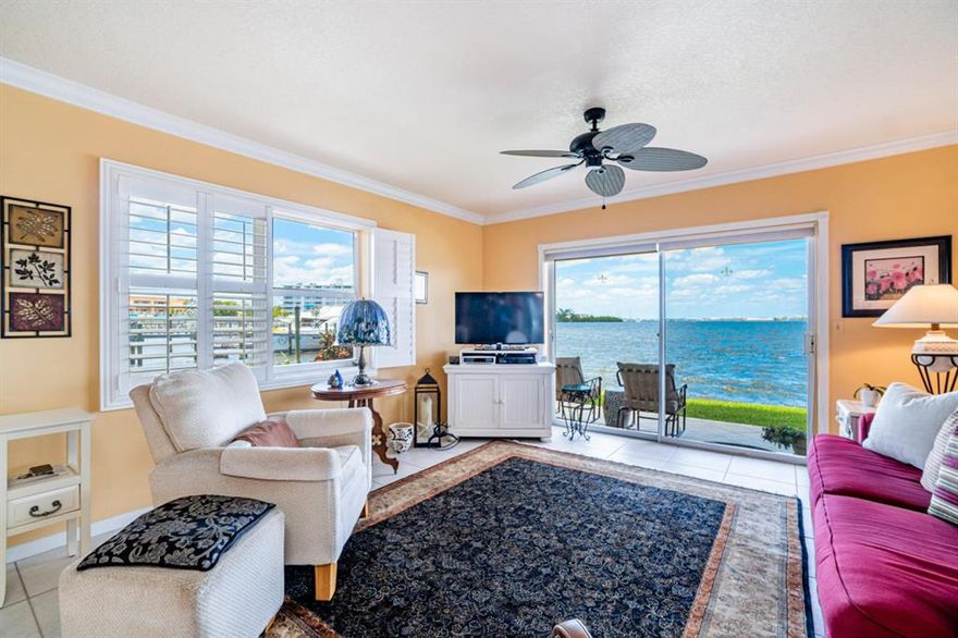 RELAX AND GO COASTAL at Island Towers!  This first floor end condo has three-sided DIRECT Intracoastal views, windows with Plantation shutters, updated kitchen and baths, washer/dryer inside, accordion shutters for storm protection, and is walking distance to the BEACH, shops and restaurants in both Lantana and Manalapan.  Bedrooms and closet space are very generous. Community has pool with grill area, large grassy lawn and common dock with private boat slips individually owned by several condo owners.