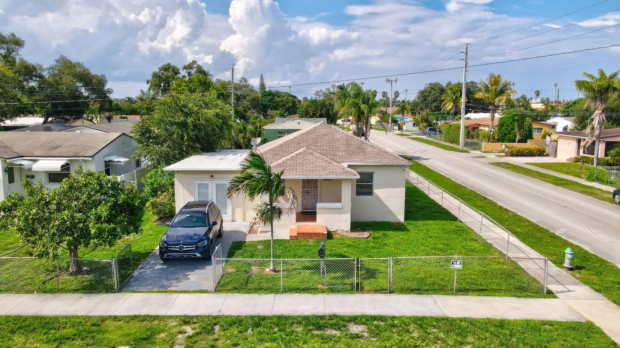 This beautiful Hollywood Park property is currently set up as a 2 bedrooms, 1 bath, updated kitchen/bath, built-out closets, and a bonus room that works as a den or small 3rd bedroom, and washer/dryer. Attached 1-bedroom, 1-bath efficiency with kitchenette.Large corner lot with room for a pool, additional structure, boat/RV storage, or entertaining. Zoned RM-9 with multifamily potential, ideal for investors or homeowners looking for a home with expansion possibilities. Prime location near beautiful Hollywood beaches, shopping, dining, and Fort Lauderdale Airport.