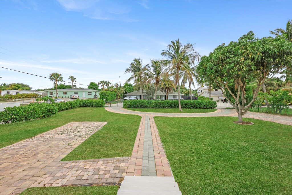 Photo of 1803 Service Road, North Palm Beach, FL 33408 (MLS # B26058618)