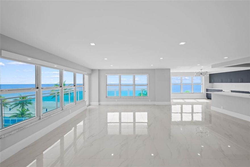This rarely available turnkey NE corner residence showcases sweeping, unobstructed ocean views from every room. Fully remodeled with premium finishes, the open-concept kitchen is ideal for entertaining, highlighted by elegant tile flooring throughout. Impact-resistant windows and doors—plus an extra slider—maximize light and provide seamless access to the expansive wraparound glass balcony. The primary suite features generous walk-in closets and a spacious double-sink bath with large shower. Added conveniences include a full laundry room with sink, tandem garage parking, and storage. Resort-style amenities offer 3 gyms, a community lounge, heated pool, sundeck, direct beach access, bike storage & more—steps to cafés, shops, and worship.