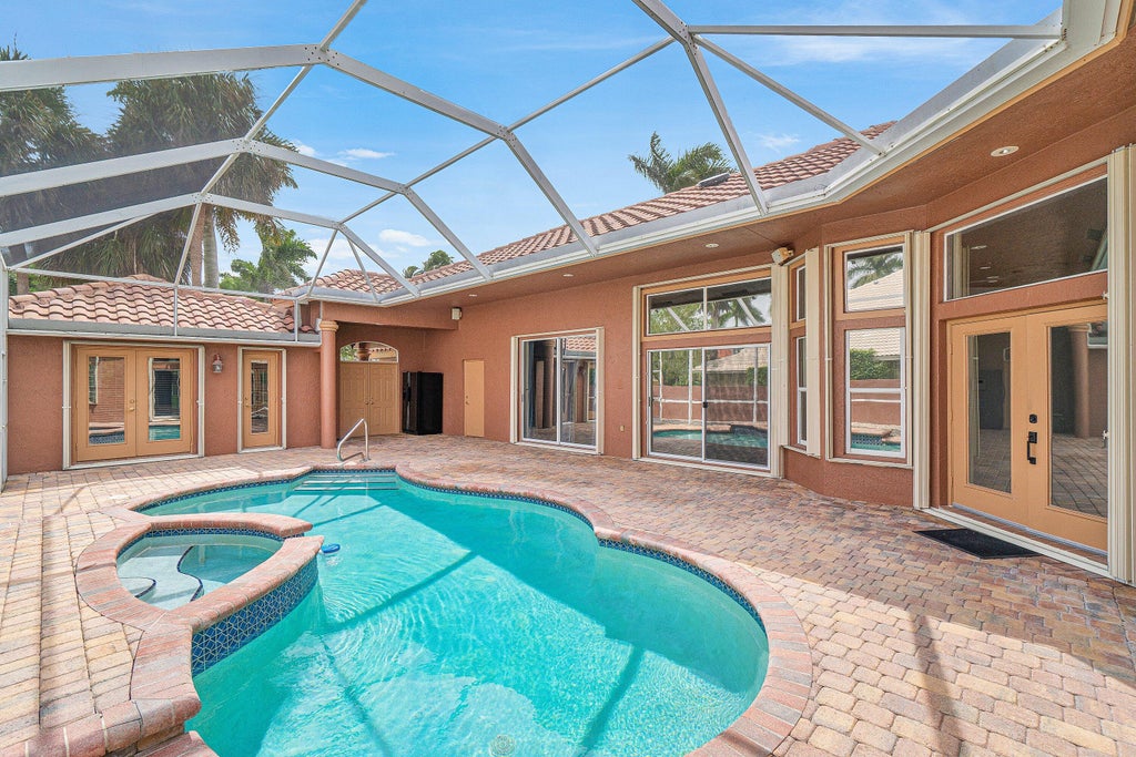 Photo of 10599 Saint Thomas Drive, Boca Raton, FL 33498 (MLS # B26083971)