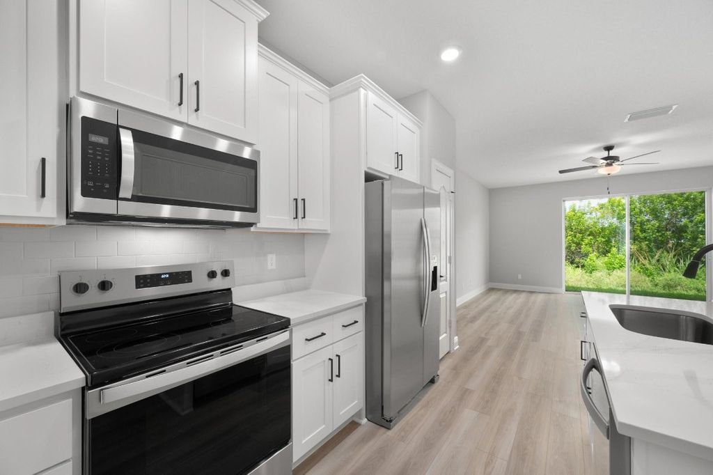 Photo of 1618 Gaiety Way, Fort Pierce, FL 34947 (MLS # F10520764)