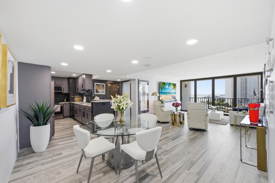 Million-dollar views without the million-dollar price tag. This beautifully renovated and fully furnished 2-bedroom, 2-bath waterfront condo offers stunning southeast exposure with panoramic views of the Intracoastal, ocean, and Palm Beach Island.   Bright and move-in ready with a split-bedroom layout, private balcony, designer furnishings, electric blinds, impact windows and doors, A/C with UV Light, newer water heater, and a full-size washer and dryer.  Enjoy resort-style amenities including a private beach and day dock, saltwater heated pool, fitness center, tiki hut, BBQ area, concierge and 24-hour gated manned security.  Boat docking available. Rent immediately—perfect for investors or seasonal use. All assessments paid and reserves fully funded. One pet allowed.      Maintenance includes cable, internet, and water. Assigned covered parking.   Prime location just minutes to Palm Beach Island, Rosemary Square, dining, shopping, and PBIA. Surrounded by ultra-luxury developments including the Ritz-Carlton Residences, Olara, ALBA, Forté on Flagler, and South Flagler House — with prices in the multi-millions — making this an exceptional value opportunity.