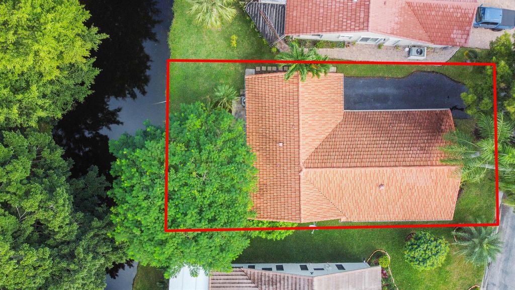 Photo of 1710 Riverwood Lane, Coral Springs, FL 33071 (MLS # R11136640)