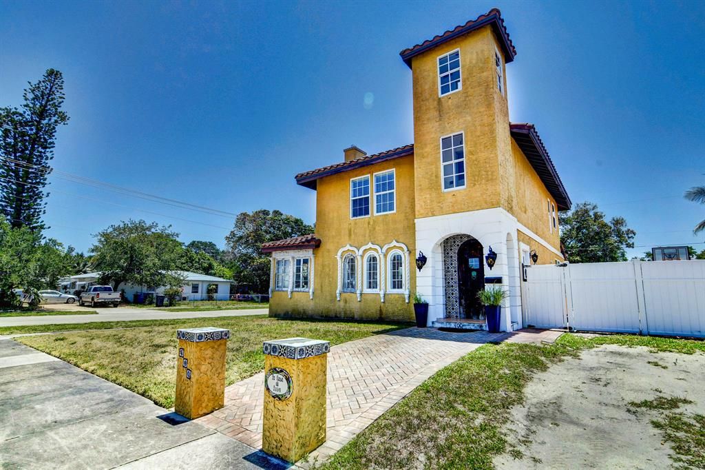 Photo of 400 Greenbriar Drive, Lake Park, FL 33403 (MLS # R10714069)