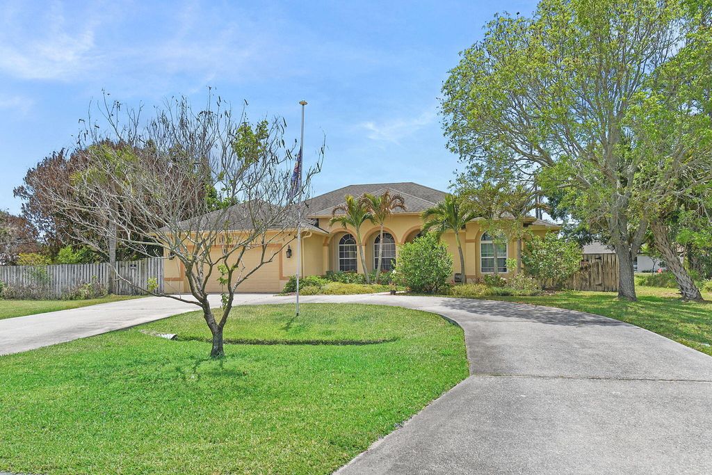 Photo of 1456 SW Del Rio Boulevard, Port Saint Lucie, FL 34953 (MLS # B26021818)