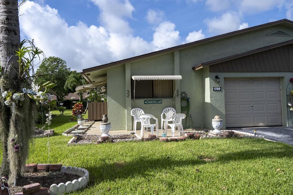 Photo of 1730 Palmland Drive, Boynton Beach, FL 33436 (MLS # R11131490)