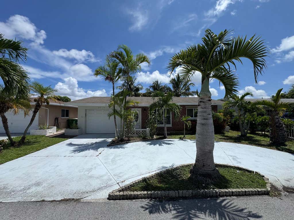 Photo of 4717 NW 49TH Place, Tamarac, FL 33319 (MLS # B26056356)