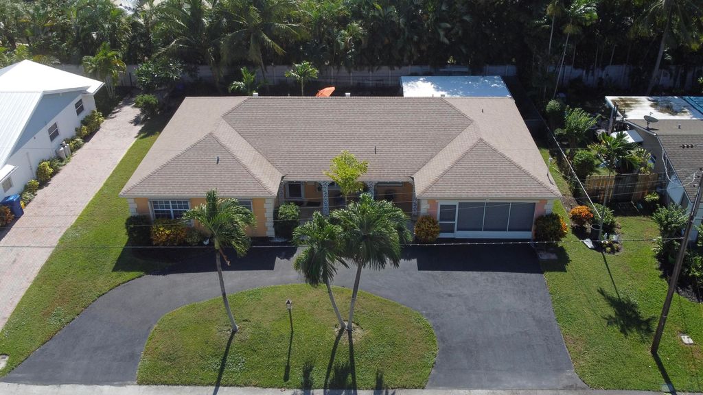 Photo of 310 Wilma Circle, Riviera Beach, FL 33404 (MLS # R11137067)