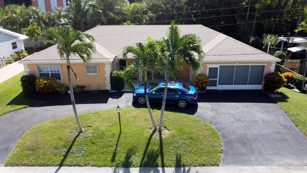 Photo of 310 Wilma Circle, Riviera Beach, FL 33404 (MLS # R11137067)