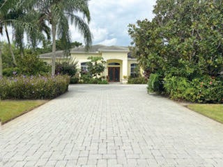 Photo of 7907 Fairway Lane, West Palm Beach, FL 33412 (MLS # B26085746)