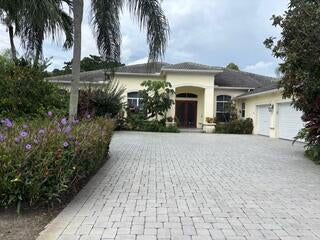 Photo of 7907 Fairway Lane, West Palm Beach, FL 33412 (MLS # B26085746)