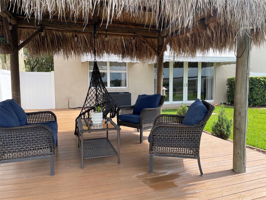 Price Improvement! Experience tranquility with convenience in this move-in-ready home in the desirable Riviera Isles! This beautifully maintained 3/2.5 Bath residence offers a perfect blend of comfort and style. Open kitchen flows into the dining and family rooms—ideal for both everyday living and entertaining. Step outside from the family room to a private patio and lush backyard, featuring a Tiki hut and deck—perfect for outdoor gatherings.  

Upstairs, the spacious MASTER SUITE includes a SPACIOUS 10x10 open seating area (den) ideal for a home office or relaxation space. Enjoy the benefits of a gated community with access to a clubhouse, pool, fitness center, and parks. Conveniently located near top-rated schools, shopping, and dining. Don’t miss this incredible opportunity!