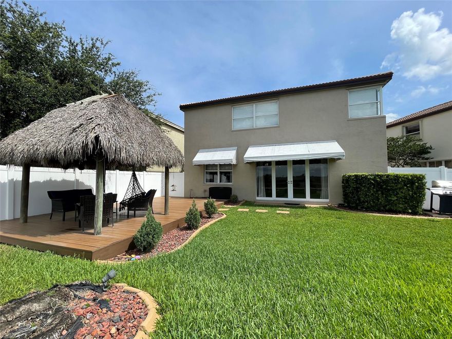 Price Improvement! Experience tranquility with convenience in this move-in-ready home in the desirable Riviera Isles! This beautifully maintained 3/2.5 Bath residence offers a perfect blend of comfort and style. Open kitchen flows into the dining and family rooms—ideal for both everyday living and entertaining. Step outside from the family room to a private patio and lush backyard, featuring a Tiki hut and deck—perfect for outdoor gatherings.  

Upstairs, the spacious MASTER SUITE includes a SPACIOUS 10x10 open seating area (den) ideal for a home office or relaxation space. Enjoy the benefits of a gated community with access to a clubhouse, pool, fitness center, and parks. Conveniently located near top-rated schools, shopping, and dining. Don’t miss this incredible opportunity!