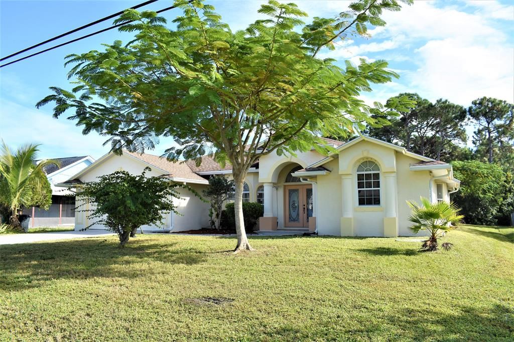 Photo of 2251 SE Berkshire Boulevard, Port Saint Lucie, FL 34952 (MLS # R10757616)