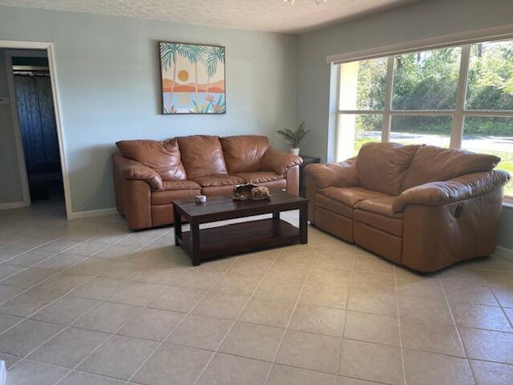 Photo of 6704 Ocala Avenue, Fort Pierce, FL 34951 (MLS # R10978418)