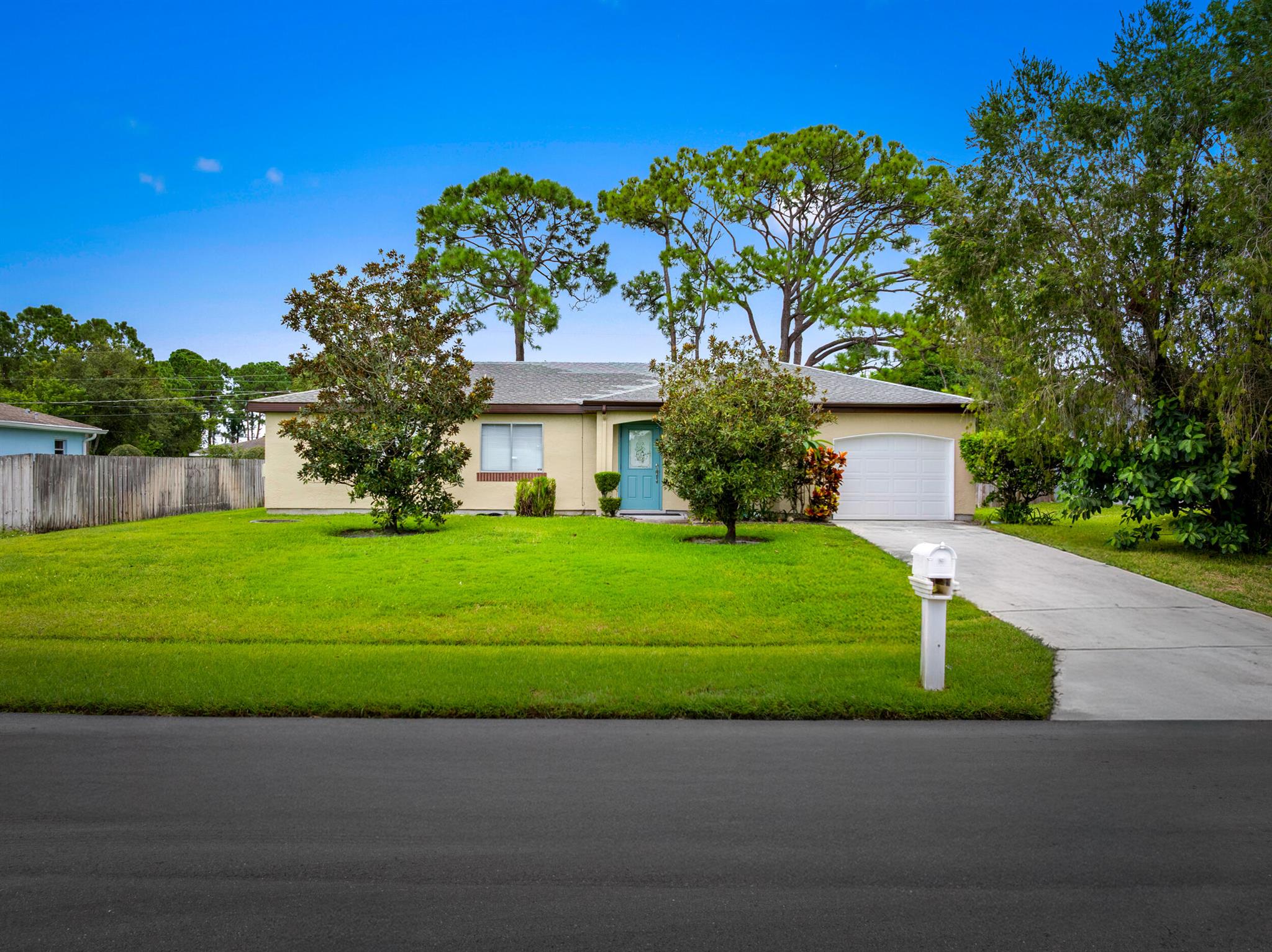 Welcome to this well-maintained 2-bedroom, 2-bathroom home offering 1,170 square feet of living space and a 1-car garage. Built in 1980, this property has been thoughtfully cared for and provides a wonderful opportunity to enjoy the Florida lifestyle.The home features a spacious living and dining area with natural light, a functional kitchen with ample cabinetry, and two comfortable bedrooms, including a primary suite with a private bathroom. The large backyard offers plenty of space for gardening, outdoor living, or future enhancements such as a pool.Centrally located between shopping, dining, parks, the interstate, and local beaches, this property is ideal for first-time homebuyers, seasonal residents, or investors.
