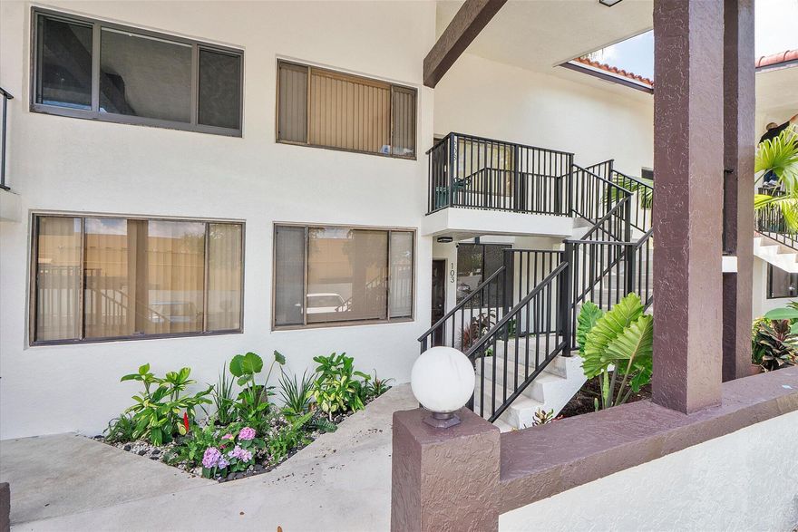 Enjoy peaceful lake views from this inviting 2-bedroom, 2-bath condo in Mira Lago, offering 1,075 square feet of well-planned living space. This light-filled residence features an open layout with volume ceilings that create an airy feel throughout. The primary suite includes a walk-in closet and an updated bath with a tiled shower and floor. Wood flooring enhances the main living areas, and the kitchen includes a brand-new stove. Relax on the screened patio overlooking the water. Located in a gated community with a pool and convenient access to shopping, dining, and well positioned near major routes.