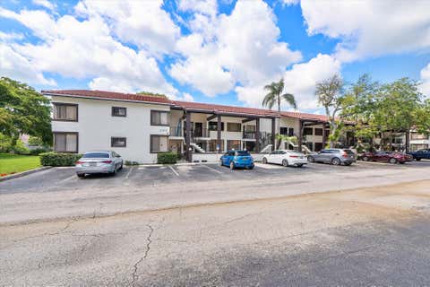 Tiny photo for 3100 NW 46th Street #203, Oakland Park, FL 33309 (MLS # F10554173)