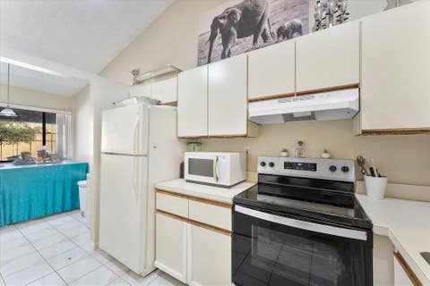 Tiny photo for 3100 NW 46th Street #203, Oakland Park, FL 33309 (MLS # F10554173)