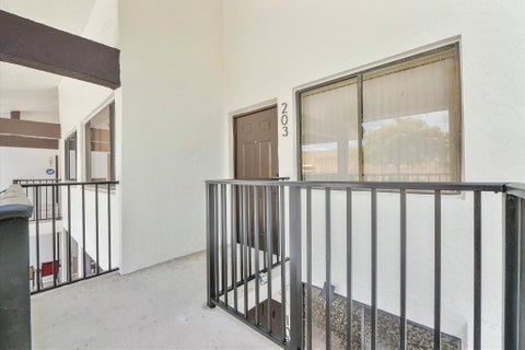 Tiny photo for 3100 NW 46th Street #203, Oakland Park, FL 33309 (MLS # F10554173)