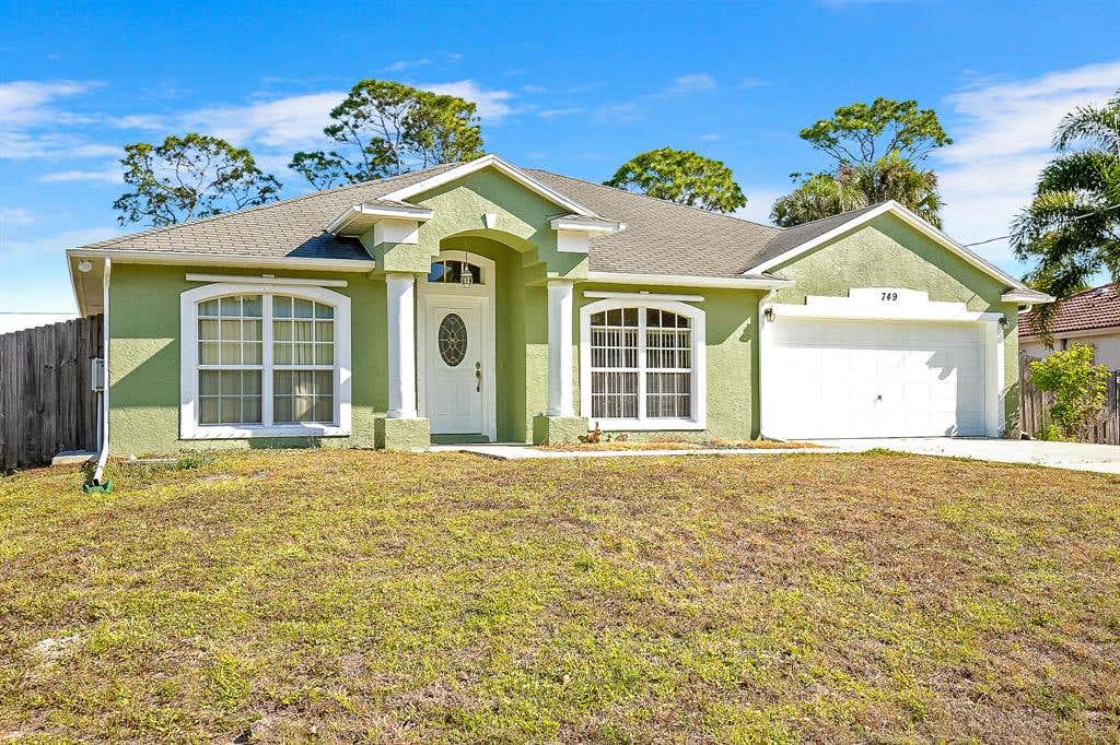 Photo of 749 SW Hillsboro Circle, Port Saint Lucie, FL 34953 (MLS # R10705793)