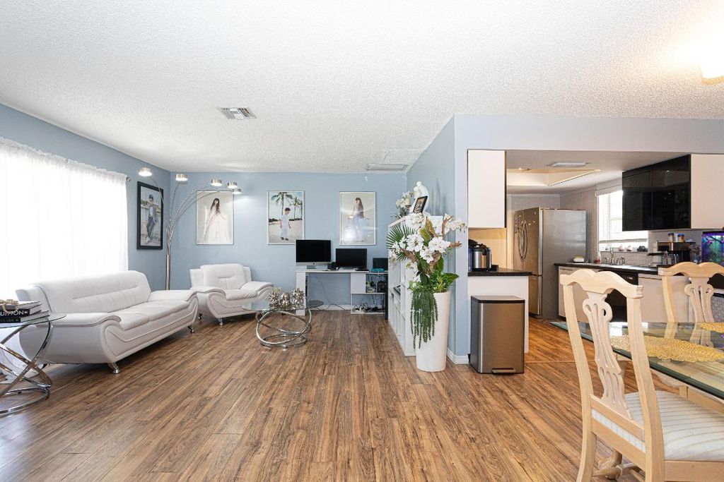 Photo of 1248 SE Ladner Street, Port Saint Lucie, FL 34983 (MLS # R10931531)