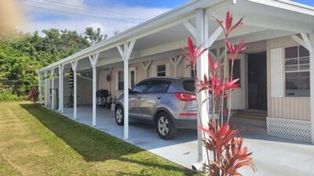 Photo of 33 Camino Del Rio, Port Saint Lucie, FL 34952 (MLS # R10964079)