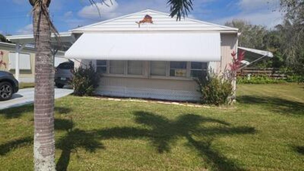 Photo of 33 Camino Del Rio, Port Saint Lucie, FL 34952 (MLS # R10964079)