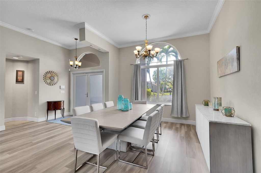 Photo of 4983 NW 107th Ave, Coral Springs, FL 33076 (MLS # F10539130)