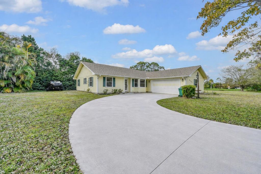 Photo of 8690 Shadylake Lane, Fort Pierce, FL 34947 (MLS # R11168254)
