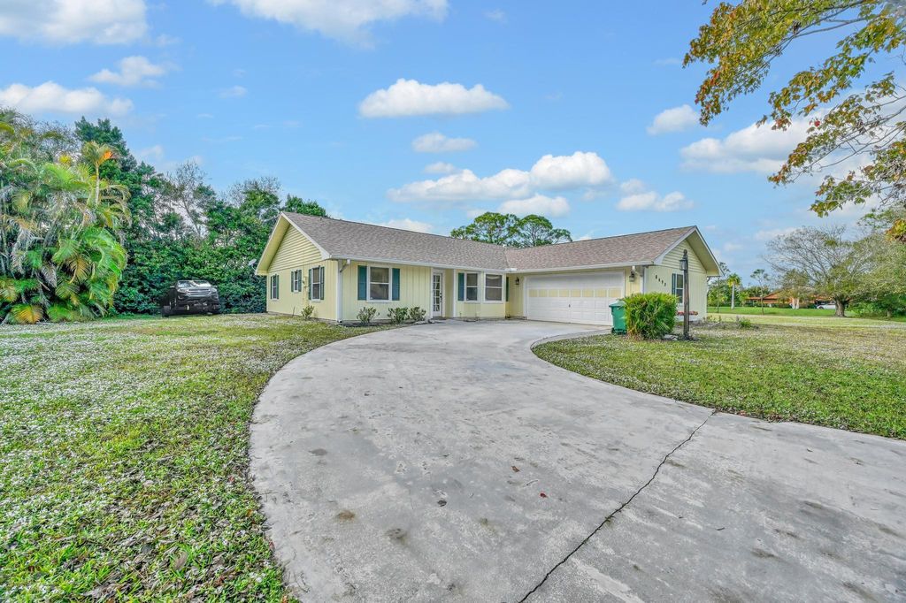 Photo of 8690 Shadylake Lane, Fort Pierce, FL 34947 (MLS # R11168254)