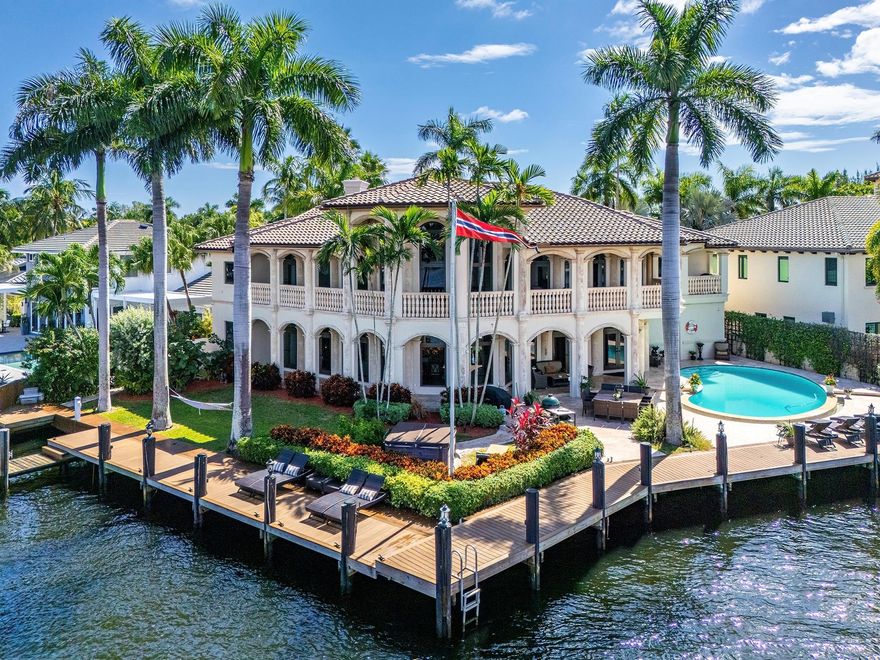 A vision of coastal grandeur, this palatial estate graces one of Fort Lauderdale’s most coveted point-lot settings w/ over 200ft on the water. Tucked away at the end of a peaceful cul-de-sac, moments from the beach. 

Soaring ceilings and walls of glass illuminate a two-story great room w/ dual living areas, formal dining, & a gourmet kitchen w/ double appliances designed for both family living and effortless entertaining at scale. Each bedroom is complemented by an en-suite bath and walk-in wardrobe, blending comfort and sophistication.

The wrap-around terrace frames mesmerizing sunset views over calm waters, while manicured grounds invite lounging, dining, & boating from your private dock — minutes from Ocean Blvd (A1A), Lauderdale-by-the-Sea, and Downtown Fort Lauderdale (Las Olas)