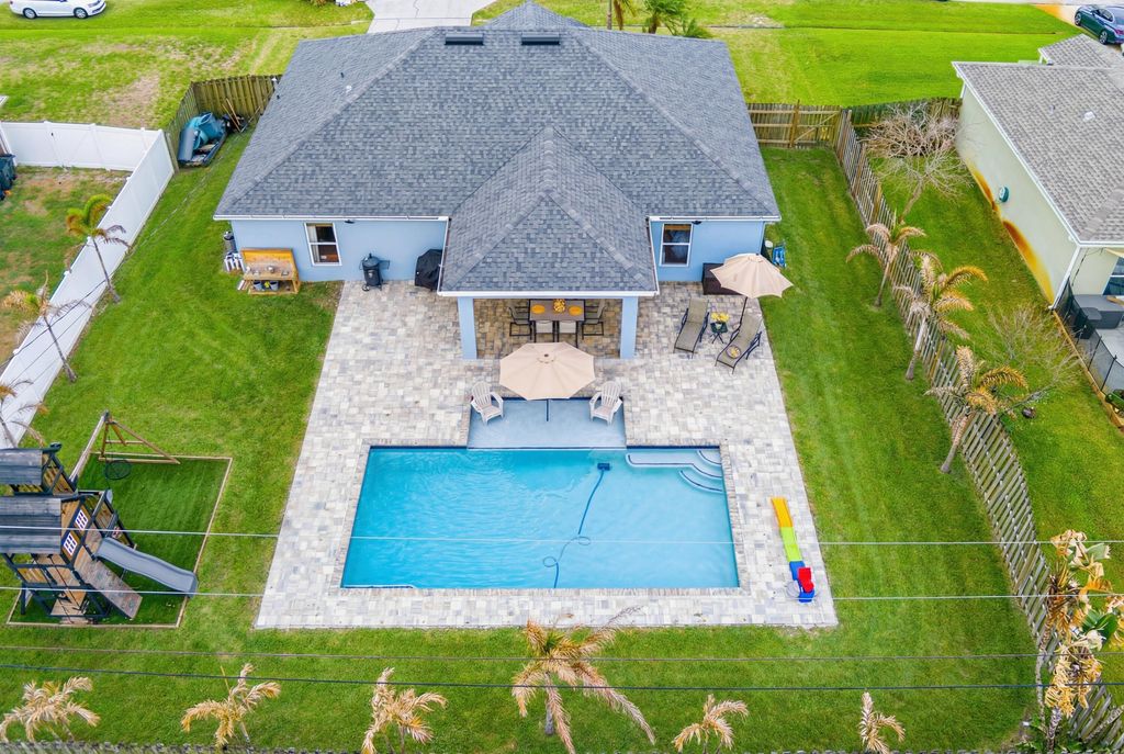 Photo of 873 SW Commonwealth Road, Port Saint Lucie, FL 34953 (MLS # B26011450)