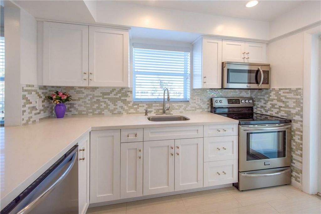 Photo of 2020 Terra Mar Drive #101, Pompano Beach, FL 33062 (MLS # B26028709)