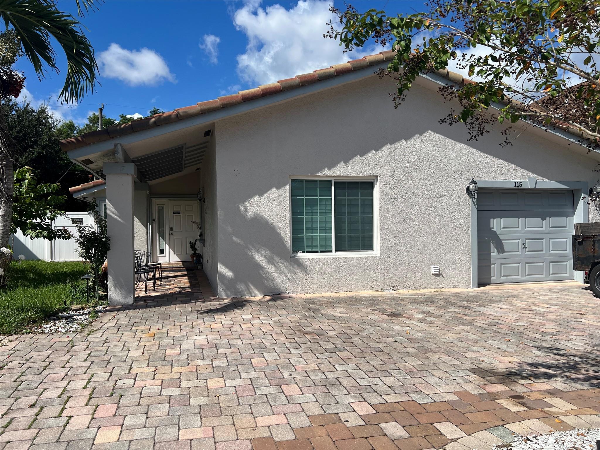 BREATH TAKING 3 BEDROOM 2 BATH 1 CAR GARAGE WITH BACK YARD IN THE HEART OF DEERFIELD BEACH 8 MINUTE DRIVE TO THE BEACH. TOTALLY REMODELED THIS SINGLE FAMILY HOME IS A PLACE TO LIVE AND ENJOY, WALKING DISTANCE TO GROCERY STORE, COFFEE PLACES, GAS STATION, PHARMACIES, BANKS, NO NEED FOR A CAR TO GO TO THESE PLACES. EXCELLENT SCHOOL DISTRICT. EASY ACCESS TO ALL MAJOR HIGHWAYS YET IN A QUIET COMMUNITY. LOTS OF PARKING IN A CIRCULAR DRIVEWAY. MUNICIPAL PARKS ALL AROUND TO ENJOY. NO CARPET, CERAMIC TILE ALL THROUGHOUT THE HOUSE. NO POPCORN, FULL SIZE LAUNDRY IN GARAGE FOR YOUR CONVENIENCE, COME SEE IT TODAY...DO NOT MISS THIS ONE HOME. NO HOA OWNERS APPROVAL ONLY...ENGLISH, ESPANOL, PORTUGUES.