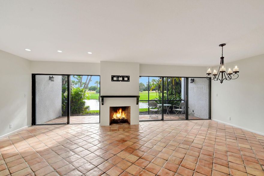 Charming 2 bedroom, 2 bathroom Villa, covered parking for 2, kitchen boast granite countertops & stainless steel appliances, Wood burning fireplace, second floor den could be 3rd bedroom, 2 screened lanai's with golf course & water view! Private community pool, 24-hour security gate & patrol. Professionally maintained grounds. Located in the heart of West Palm Beach minutes from Palm Beach Island, Easy access to The Royal Poinciana Plaza, The Breakers Hotel, Kravis Center, Tri-Rail, Brightline, Palm Beach Int'l Airport, beautiful beaches, endless shopping and dining. Your not just buying a home its a life style!