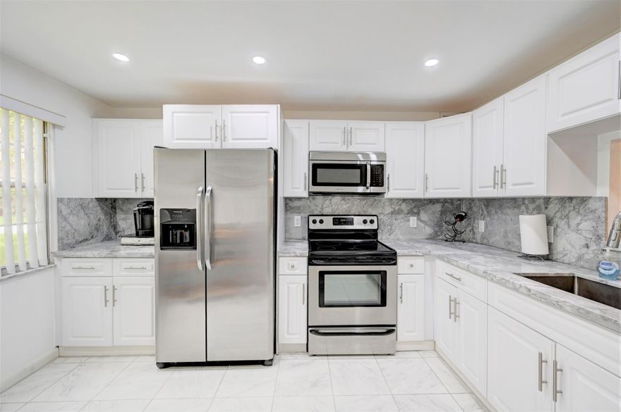 Corner furnished patio enclosure with a door for a short walk to the village pool. Updated kitchen and ceiling, all tile, and windows in each bathroom. A/C and water heater both installed in 2013. See all photos and then see for yourself. Vacant park in #101