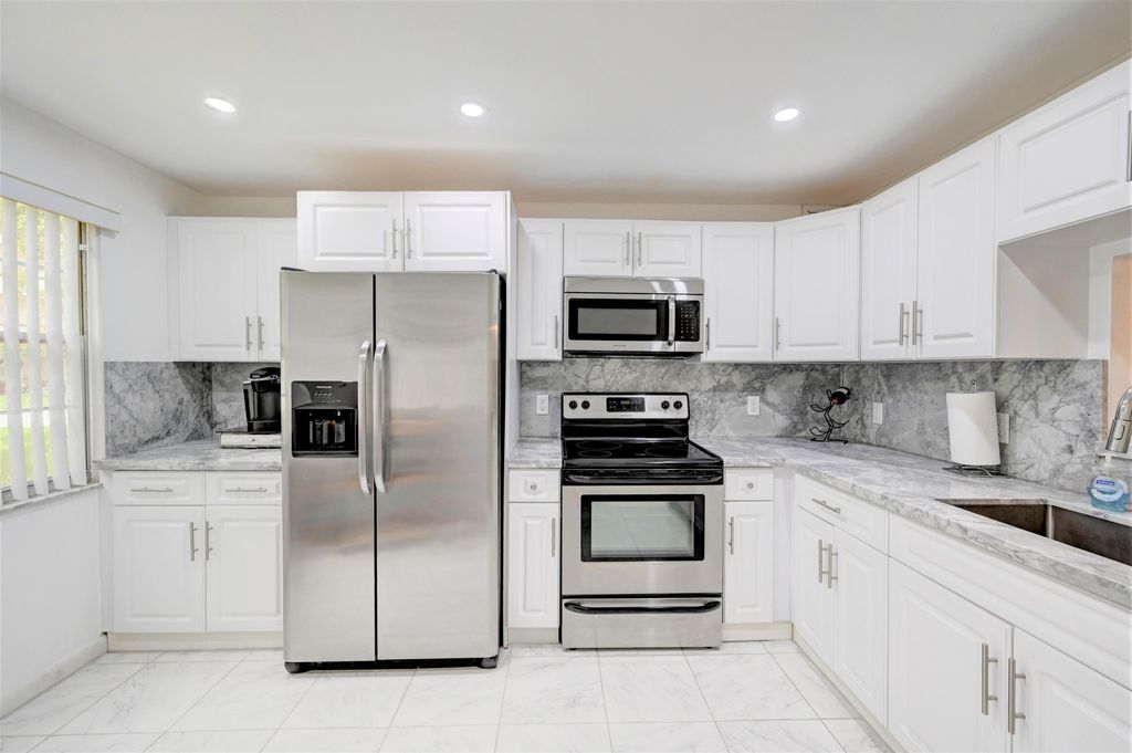 Photo of 2504 Antigua Terrace #A1, Coconut Creek, FL 33066 (MLS # B26017329)