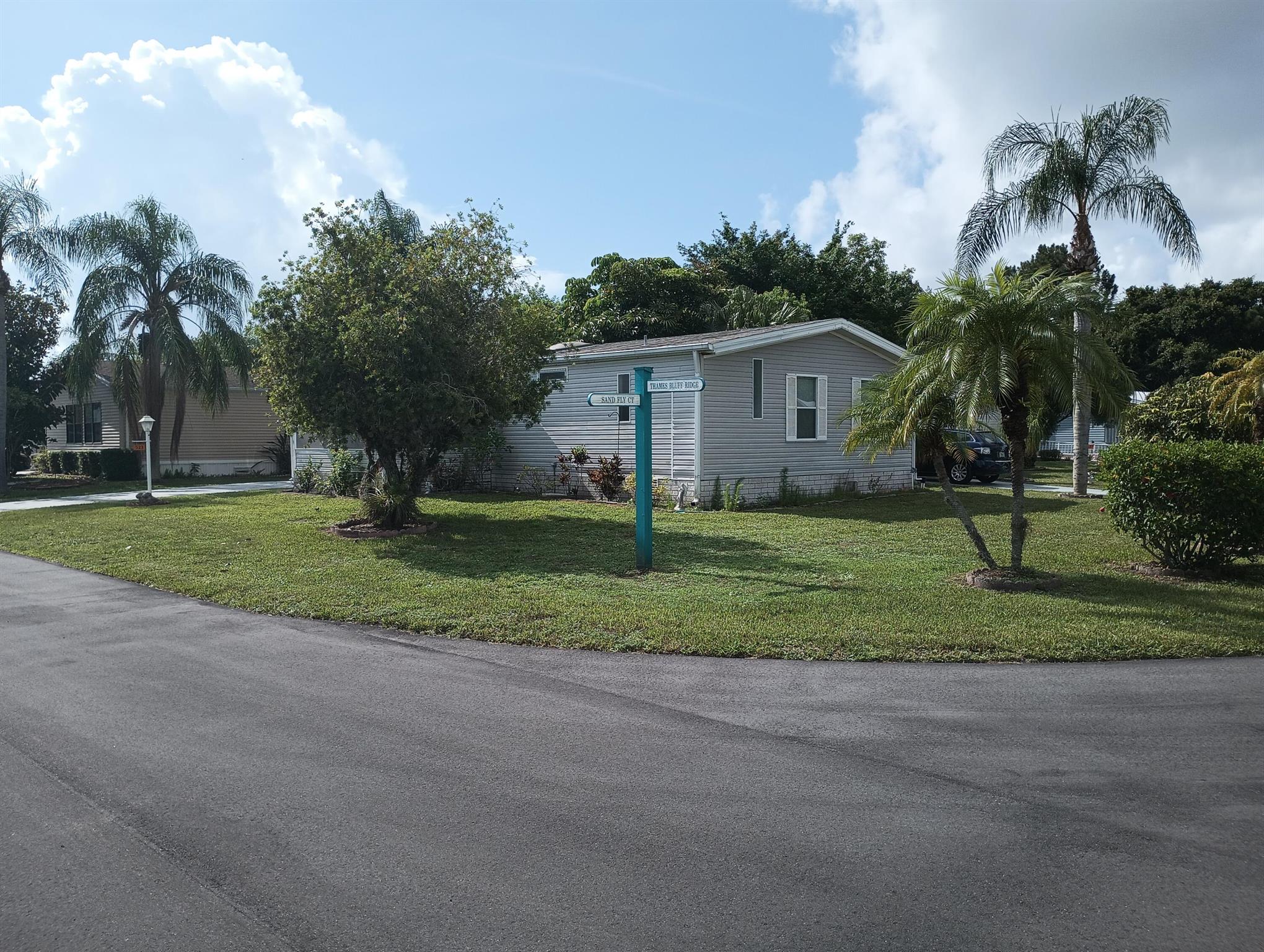 AC new 2018Welcome to the Good Life Located in lovely Tropical Isles 55 Plus community, this pristine 2 bedroom 2 bath home is move in ready.Furniture stays or we can donate to Charity The vaulted ceiling gives the home an expansive feel along with the extra large kitchen with ample cupboards, counterspace, and pantry.Lot rent approx $730 per month