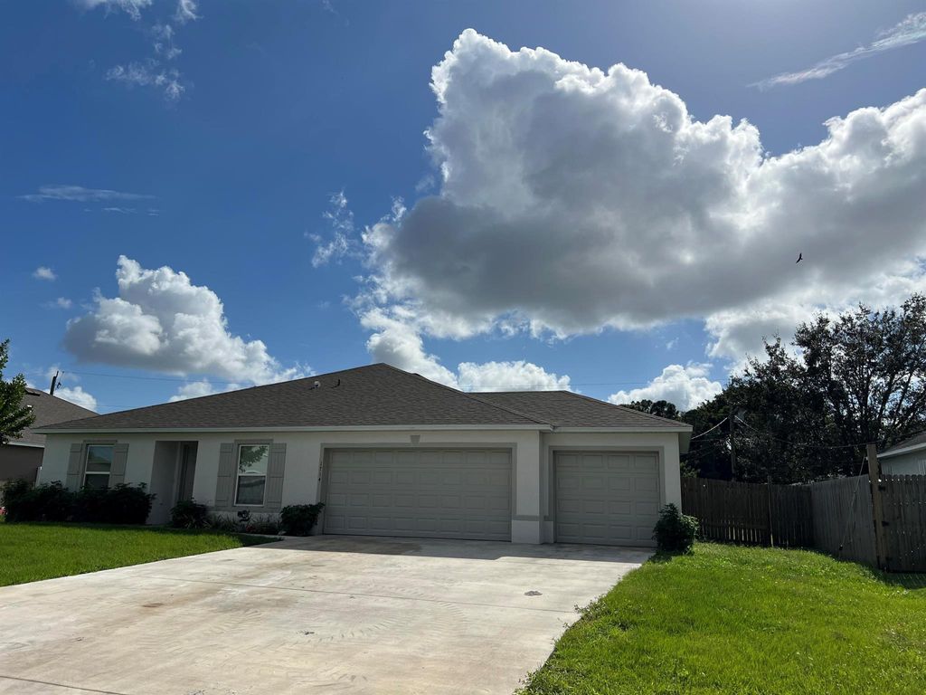 Photo of 1714 SW Haylake Avenue, Port Saint Lucie, FL 34953 (MLS # R11036914)
