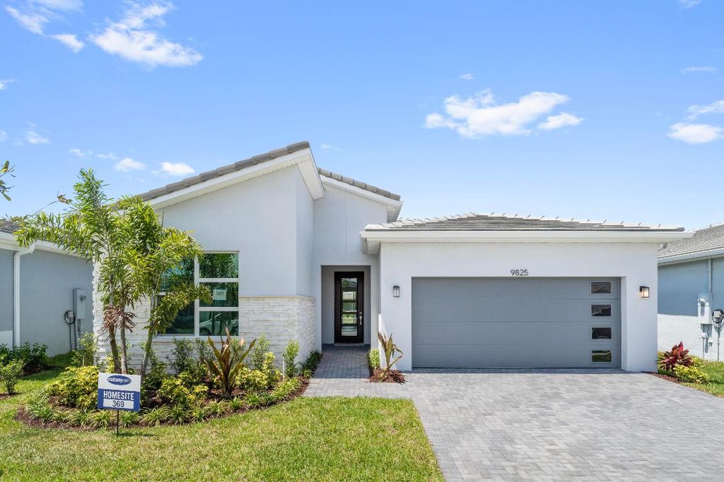 Photo of 9825 SW Isabelline Drive, Port Saint Lucie, FL 34987 (MLS # R10912159)