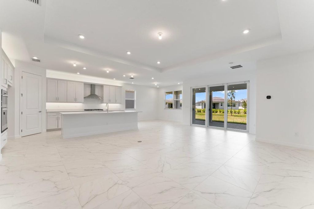 Photo of 9825 SW Isabelline Drive, Port Saint Lucie, FL 34987 (MLS # R10912159)