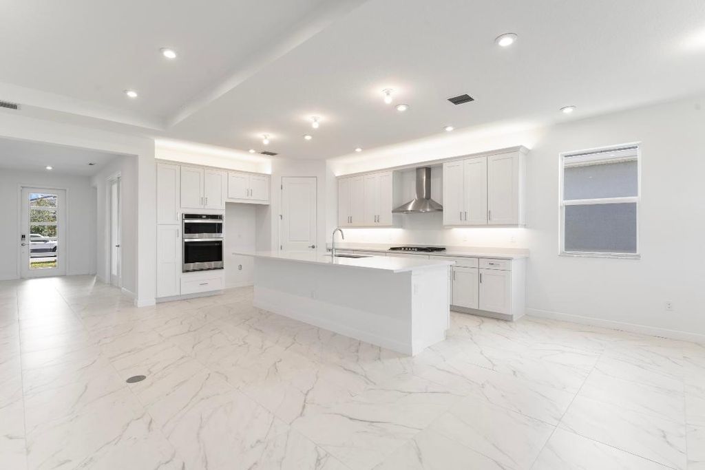 Photo of 9825 SW Isabelline Drive, Port Saint Lucie, FL 34987 (MLS # R10912159)